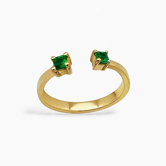 Anillo oro 18k con dos esmeraldas